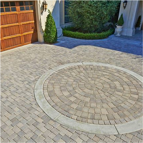 Antique Cobble One & Two installed on driveway in a circular I pattern.