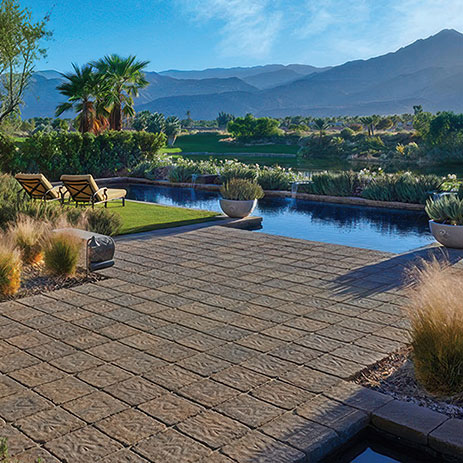 Sand-Stone-Mocha Estate Cobble II installed in a stack bond pattern.