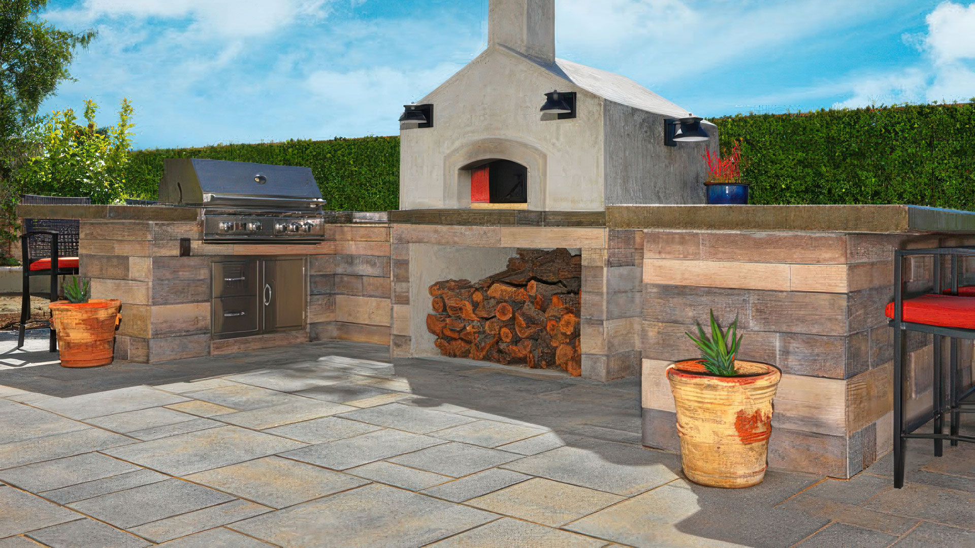 Blended Gray Copper Charcoal Paseo one & two paving stones installed in a ashlar pattern for outdoor kitchen.