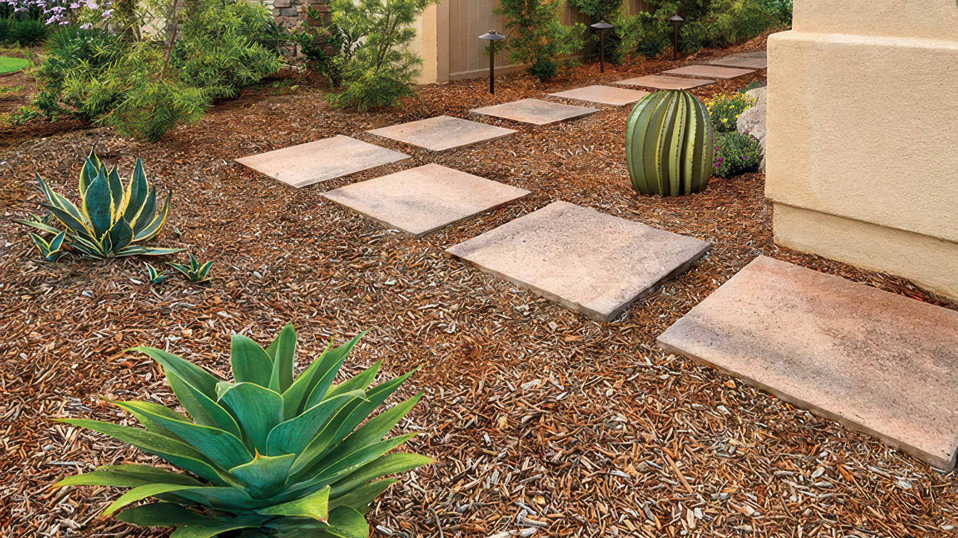 Adobe-Copper-Mocha Pavilion two paving stones installed as stepping stones.