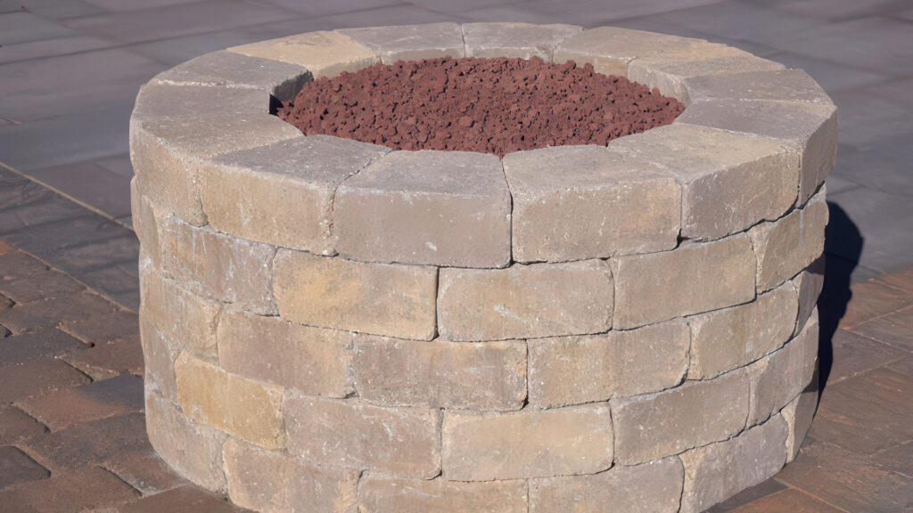 fire ring built with rustic wall stone in blended sand stone mocha.