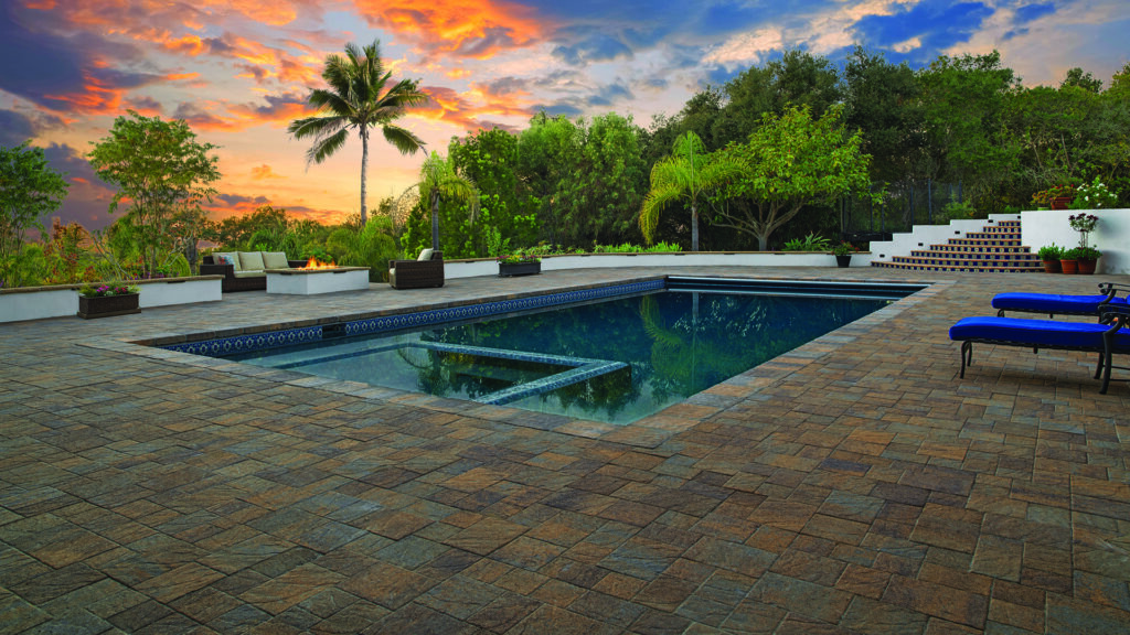 Slate Stone in Tuscan installed in a random ashlar pattern. Pool coping is Estate Cobble II (tumbled) in Tuscan.